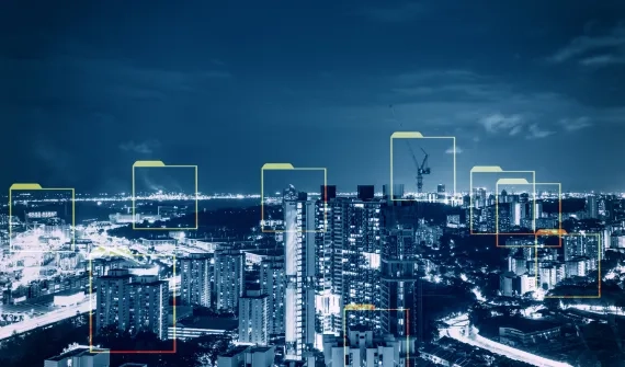 View of residential buildings in Singapore at night through a blue tone filter