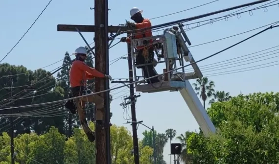 LA line workers checking overhead cables